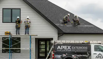 Professional vinyl siding installation on home exterior in Rochester, NY