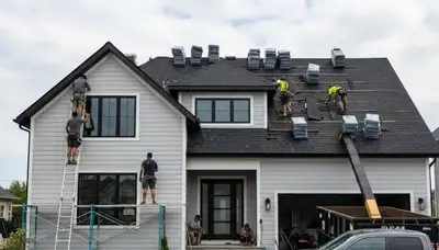 Vinyl siding and roof replacement by Next Level Exteriors in Rochester, NY
